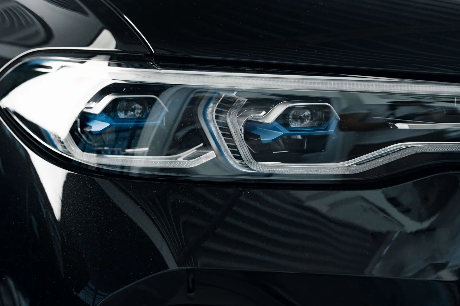Headlights of a new white luxury car