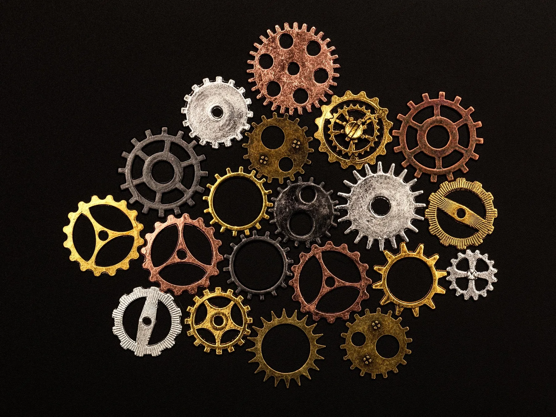 Group of different colorful cogwheels